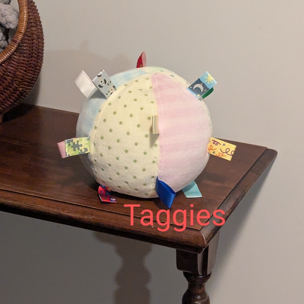 Taggies. Green and Yellow Sensory Ball With A Rattle Inside.  Colourful Tags.